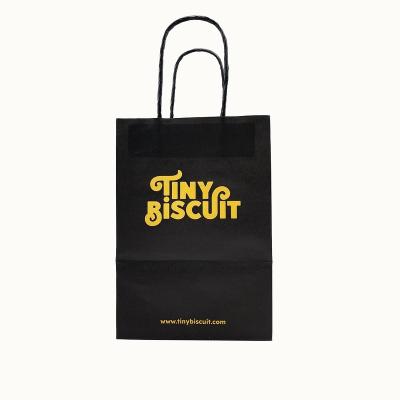 China Recycled Materials Customized Printed Logo Flap Die Cut Black Kraft Paper Handle Shop Heavy Duty Takeout Bags for sale