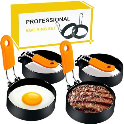 China Fashionable Egg Rings Set Of 4 Non-Stick To Fry Stainless Steel Round Pan With Anti-scald Handle for sale