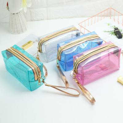 China OEM Large Capacity Transparent Jelly Make Travel Glitter Shiny PVC Up Pouch Custom Waterproof Clear Cosmetic Bag for sale