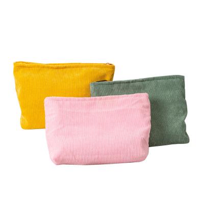 China Fashion 2022 New Customize Medium Cheap Canvas Women Men Wash Makeup Bag Corduroy Cosmetic Bag for sale