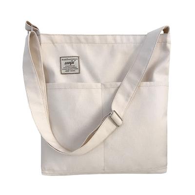 China BSCI OEM Factory New Design Fashion Reusable Cotton Canvas Handled Heavy Duty Large Tote Bag With Shoulder Strap for sale