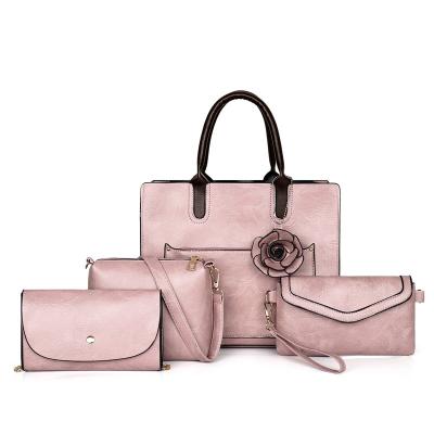 China Manufacturers Daily Used Wholesale New Cheap High Capacity Women's Leather Purses Handbags for sale