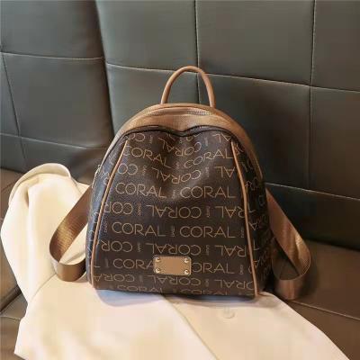 China 2022 waterproof new street trend fashion embossed large capacity travel casual lady bags backpack for sale