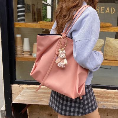 China NATIONAL 2021 Summer New Niche Design Wax Solid Color Single Shoulder Bag Oily Leather Armpit Handheld Middle-aged Bag for sale