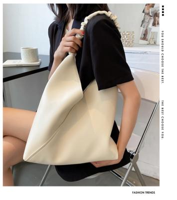 China Retro Bucket Bag Pure Texture Lady Fashion Simple Color Shoulder Bag Armpit Woman Bag for sale