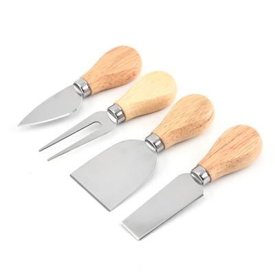 China Sustainable Kitchen Instruments 4 Piece Set Cheese Knife Spatula Shovel Fork With Wooden Handle for sale