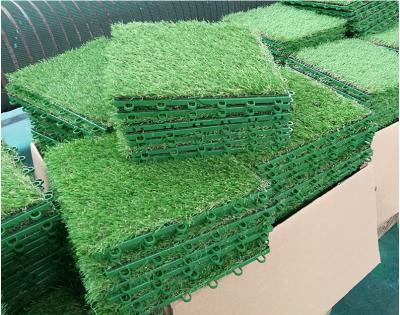 China Kindergarten Stock Interlocking Artificial Grass Tile Plant Wholesale Price for sale