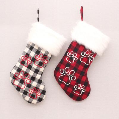 China Eco-Friendly 46 Cm Red And Black Checked Cloth Embroidered Dog Paw Pattern Plush Velvet Christmas Stocking Giant Christmas Stocking Bags for sale