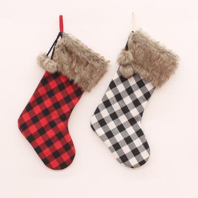 China Jurassic Xmas Bag Polyester Fluff Christmas Stocking Christmas Tree Ornament Sublimation Blanks Santa Claus Canvas Pendant Bag for sale