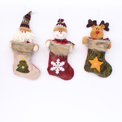 China Original Design Hanging Christmas Decorations Plush Christmas Stocking Santa Bags Christmas Family Holiday Family Decoration Pyrar Ornament for sale