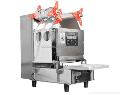 China 35kg Bubble Tea Plastic Cup Sealing Machine DUOQI QDF-95 with Cup Filling and Sealing for sale