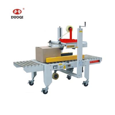 China DUOQI FXJ-5050 Máquina semiautomática de sellado con cinta de sellado de cartón en venta