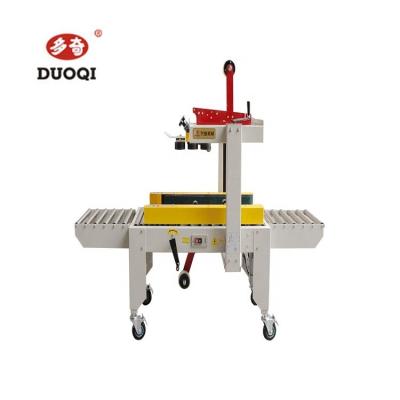 China Duoqi FXJ-4030S Semi Automatic Left and Right Drive Belt Tape Box Carton Sealing Machine for sale