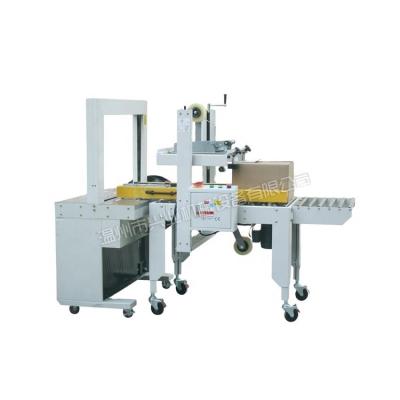 China 120 KG Capacidad DUOQI FXJ-5050 Máquina semiautomática de sellado de cartón con cinta de sellado 220 V en venta