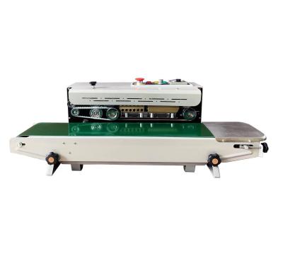 China 23kg Electric Driven Continuous Horizontal Heat Sealing Machine for Plastic Film Bags for sale