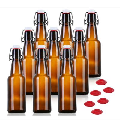 China Wholesale Round Portable Sealed Glass Bottles Clear Glass Beer Packaging Red Wine Bottle for sale