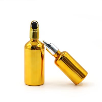 China High Qiality Unique High End High Quality Cosmetic Essential Oil Luxury Gold Glass Bottles Vials for sale