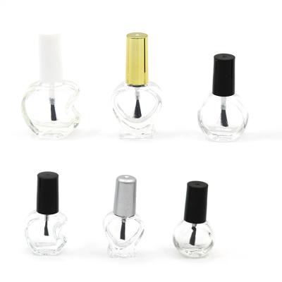 China Wholesale Daily Life Empty Luxury Mini Clear Unique Heart Shaped Nail Polish Glass Bottle With Black Brush Caps for sale