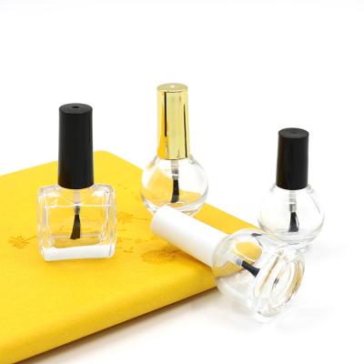 China Custom Unique Clear Empty Cosmetic Glass Bottle Daily Life Stain Supply Nail Polish Bottle Brush Bottle With Brush for sale