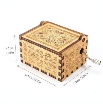 China Custom OEM New Arrival Mini Hand Crank Laser Engraved Wood Crank Music Box for sale