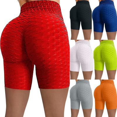 China Anti-wrinkle ladies high waist buttocks sports jacquard bubble yoga pants five point stretch women abbreviations for sale