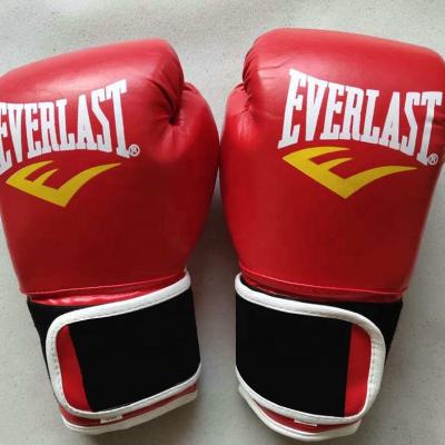 China Martial Arts Studios Custom Logo Twins Training Leather Boxing Gloves for sale