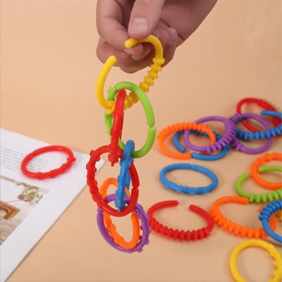 China Wholesale Mini Baby Plastic Funny Educational Toy Hang Ring Sensory Noise Tubes for sale