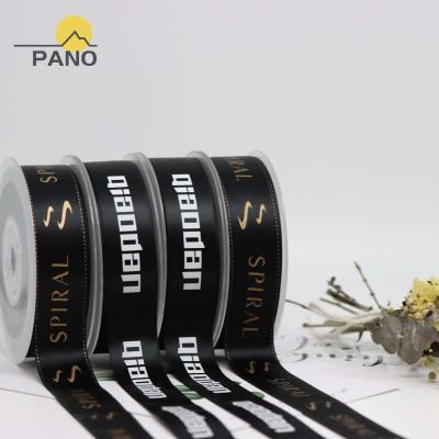 China OEM Factory High Tenacity Gift Ribbon Custom Sizes Brand Logo Artwork Printed Satin Ribbon With Gold Logo for sale