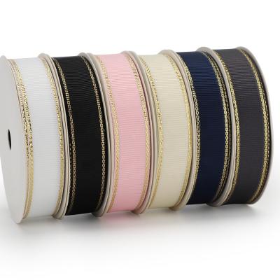 China Custom Viable High Quality Solid Color Glitter Silver Edge Grosgrain Woven Metallic Ribbon For Gift Wedding Wrapping for sale