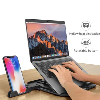 China Adjustable Free Shipping 1 Stand 360 Rotation Foldable Plastic Base Sample OK Notebook Table Stand Phone Holder Foldable Laptop Stand for sale