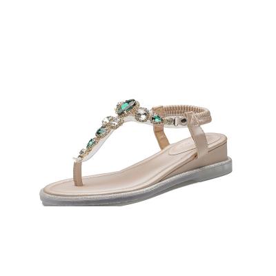 China New PVC Beach Flip Flop Sandals Women Flower Cheap Price Open Toe Slippers Flat Pearl Stud Roman Style Sandals Women for sale