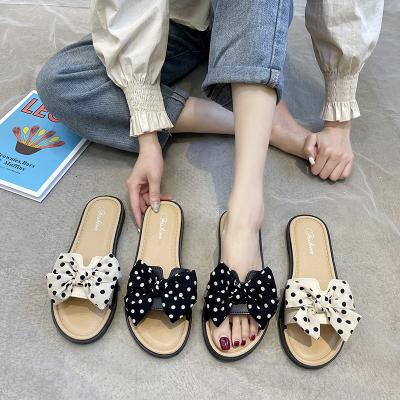 China Wholesale PVC Popular Bow Ladies Slippers Solid Color Slippers Indoor Outdoor Indoor Decorative Flat Slippers for sale