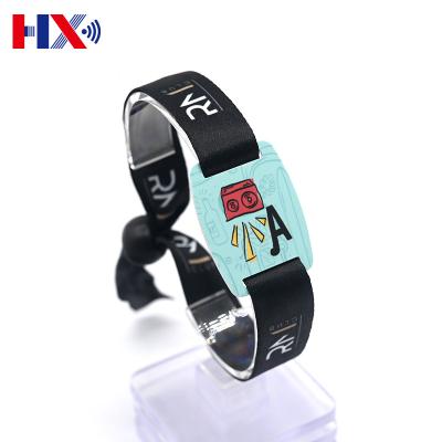 China Waterproof / Waterproof Popular Festival One Time Use RFID Woven Fabric Wristbands F08 1k Wristband For Sporting Events for sale