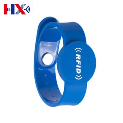 China Customized Customized Waterproof/Waterproof NFC RFID Wrist Bands Wristband PVC Rubber Wristband With Laser Number for sale