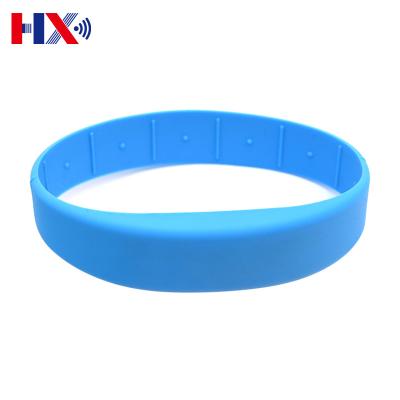 China NFC factory direct 13.56Mhz programmable waterproof passive wristband waterproof/waterproof for amusement parks for sale