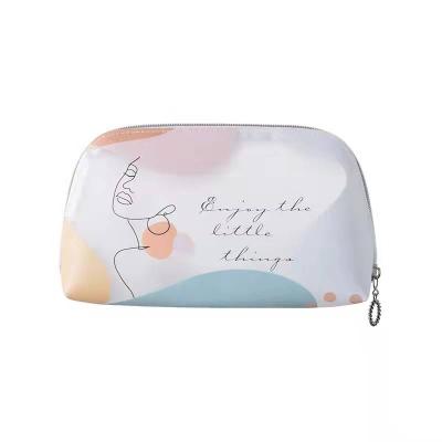 China Small PVC Holographic Durable Waterproof Clear Makeup Pouch Pouch TPU Clear Cosmetic Bag for sale