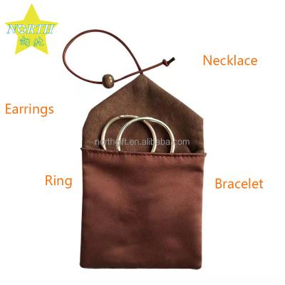 China Jewelry Store Brown Stain New Jewelry Display Pouch Jewelry OEM Color Custom Bag With String for sale