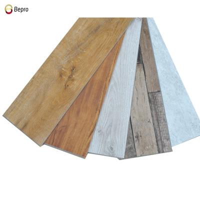 China Modern Easy Click Wood Embossed Rigid SPC Flooring SPC Click Lock Vinyl Planks for sale