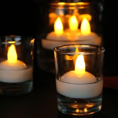 China 12 Pieces Waterproof Battery Operated Candle Light Color Changing Floating Candle Pack Flameless Led Candle for sale