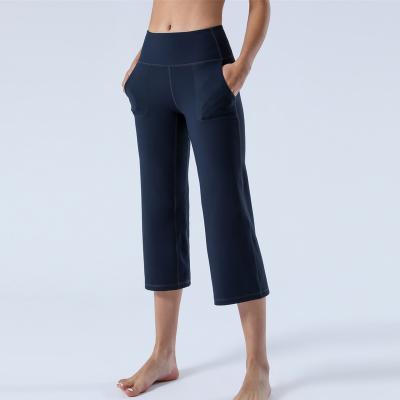 China Breathable Yoga Pants With Pockets For Women High Waist Workout Bootleg Pants Tummy Control Gaiters Phone Pockets Works Pants For Wome for sale