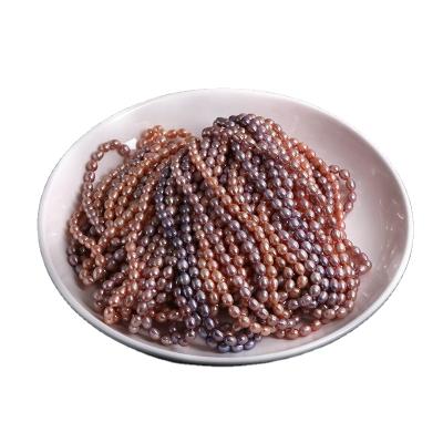 China Freshwater Pearl AA+ Grade 6.5~11.5mm 40cm 16 Inch Drop Shape Rice Shape Pearl Strand Natural Freshwater Pearl for sale