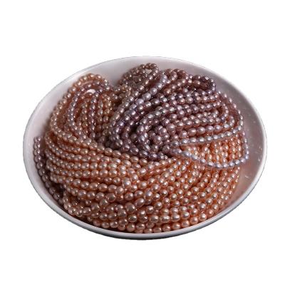 China Freshwater Pearl AAA+ Grade 6.5~11.5mm 40cm 16 Inch Drop Shape Rice Shape Pearl Strand Natural Freshwater Pearl for sale