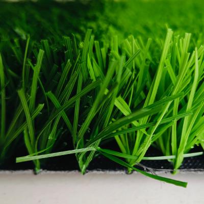 China PP+Leno Backing 50mm Pile Height Sports Artificial Turf With Low Maintenance And Two Colors In Two Areas for sale