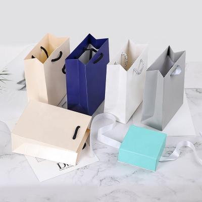 China Manufacturers Wholesale Recyclable High Quality Custom Kraft Paper Gift Shopping Jewelry Shopping Paper Bag for sale