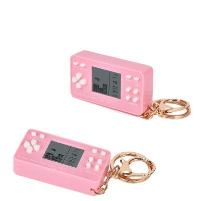 China Creative Handheld Portable Mini Brick Game Machine Players Key Chain Console Game Present For Kids Adult 57*55*42.5cm for sale