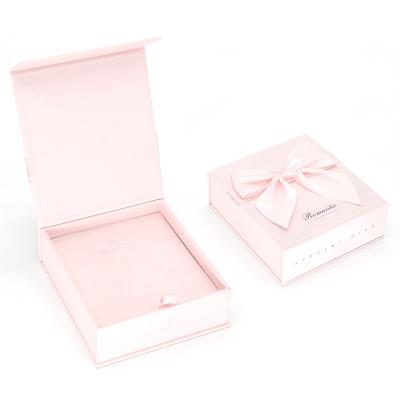 China Custom Recyclable Logo Bow Luxury Magnetic Flap Bracelet Necklace Ring Gift Boxes Pink Jewelry Box for sale