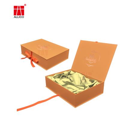 China Recyclable Orange Gift Box Logo Wig Packaging Boxes Luxury Custom Ribbon Clamshell Hair Packaging for sale