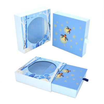 China Creative Recycled Materials Skin Care Gift Set Paper Packaging Customized Transparent Skylight Gift Packaging Boxes for sale