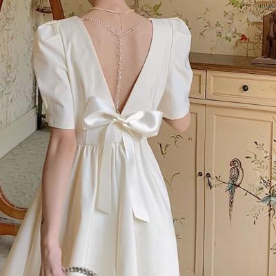 China Sustainable Backless Dress Women Casual Bow Design Vintage Short Sleeve Mini Dress Female Solid Party One Piece Dress Korean 2023 Summer for sale