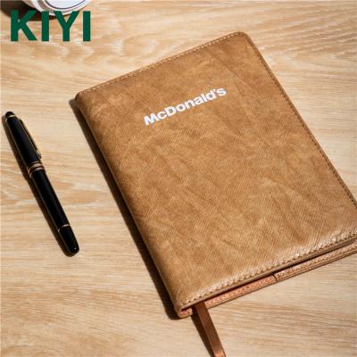 China Customized Printed Tyvek Paper Cover Water Resistant Lightweight Notebook for sale